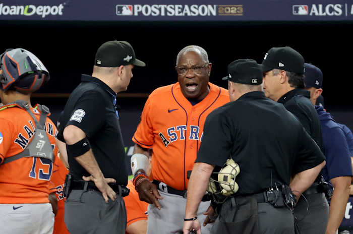 Oct 20, 2023; Arlington, Texas, USA; Houston Astros manager Dusty Baker (12) argues with umpires after Texas Rangers right fielder Adolis Garcia (not pictured) was hit by a pitch and Astros pitcher Bryan Abreu (not pictured) was ejected during the eighth inning of game five in the ALCS for the 2023 MLB playoffs at Globe Life Field. Mandatory Credit: Kevin Jairaj-USA TODAY Sports